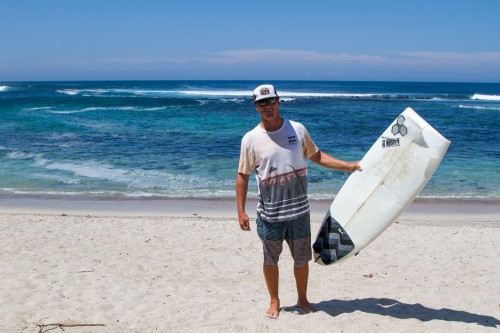 Here I am holding my broken stick, I did not find the nose. Im sure some local grom will use this board to learn on